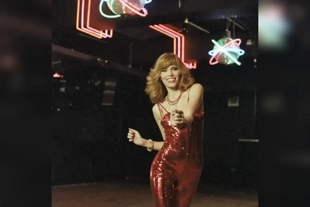 1970s disco performer representing the fictional band Xanadu Express performing at the 77 Club in London.